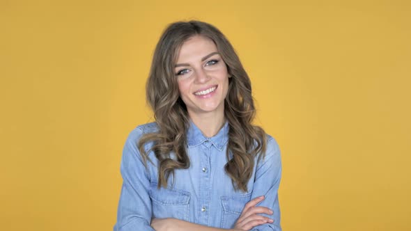 Yes Young Girl Shaking Head to Accept Isolated on Yellow Background