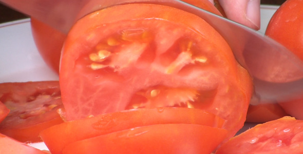 Slicing A Fresh Tomato