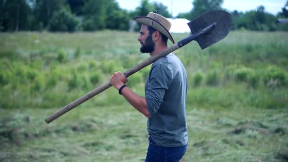 Agronomist Digs Shovel On Field. Farmer Cultivate Vegetables Farm. Farmland Plantation Organic.