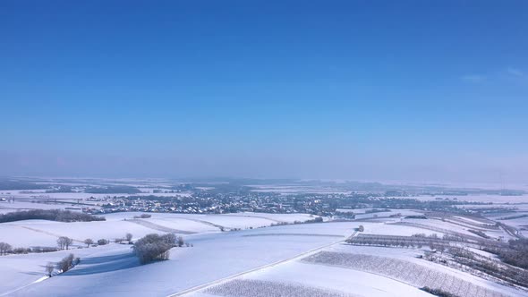 Frozen Winery Region Near Zistersdorf Town In Weinviertel, Lower Austria. Aerial Wide Shot