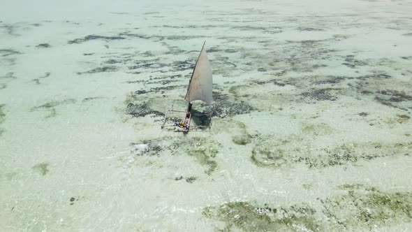 Aerial View of a Boat in the Ocean Near the Coast of Zanzibar Tanzania