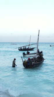 Vertical Video Boats in the Ocean Near the Coast of Zanzibar Tanzania