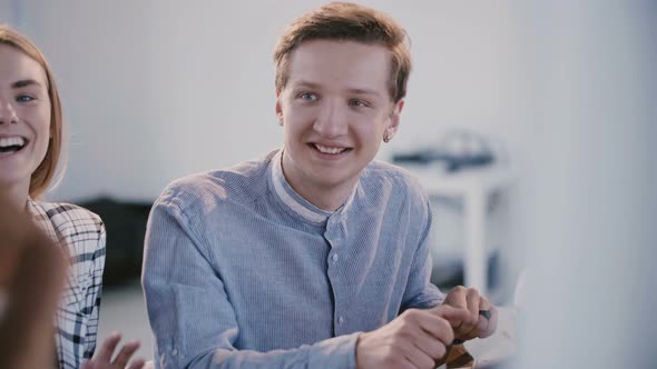 Young Professional Caucasian Casual Corporate Colleagues Smiling, Listening To Boss Talking Behind