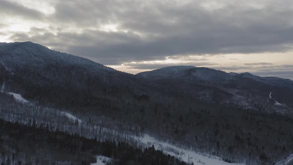 Creepy Abandoned ski resort at sunset AERIAL SLIDE