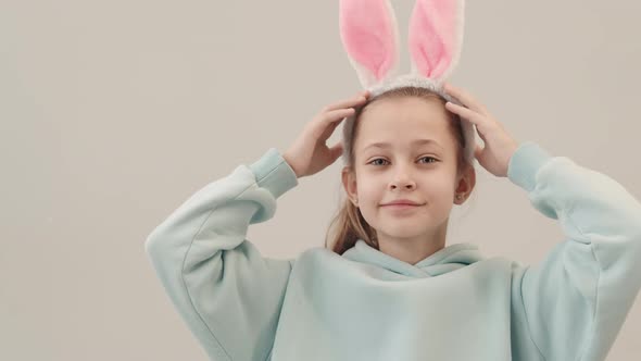 Portrait of Little Girl Wearing Bunny Ears