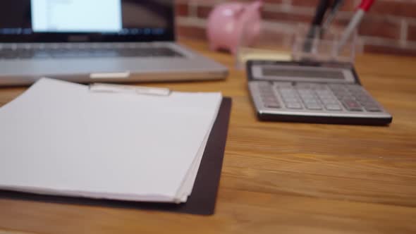 Smm Word is Written on Wooden Cubes That Put Their Hands on Office Desk with Papers and Laptop