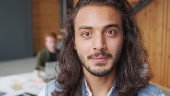 Handsome Young Businessman Smiling for Camera