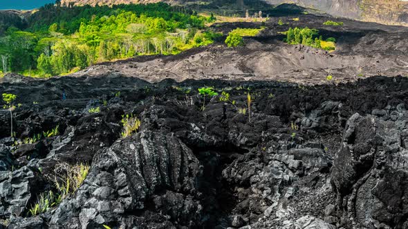 Frozen Black Lava River at the Volcano Batur in Bali, Indonesia. Timelapse 