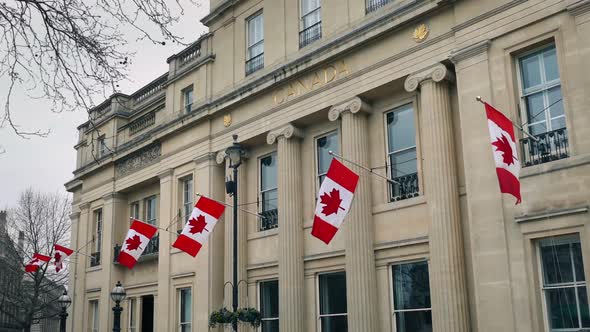 Large Old Building With Canadian Flags