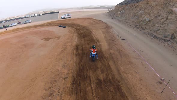 Overhead shot Of Motocross Kid Rider In Action On Motocross , Saudi Arabia