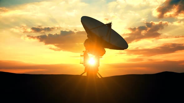 Military Radar Exploring Evening Sky against Scenic Sunset