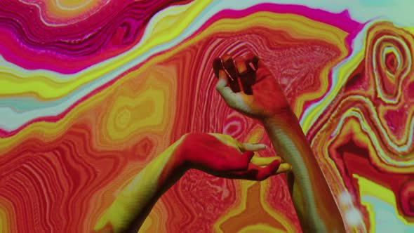 Female Hands Moving on Neon Abstract Background