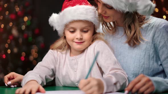 Woman Enjoying Motherhood Write List Wishes to Santa Claus