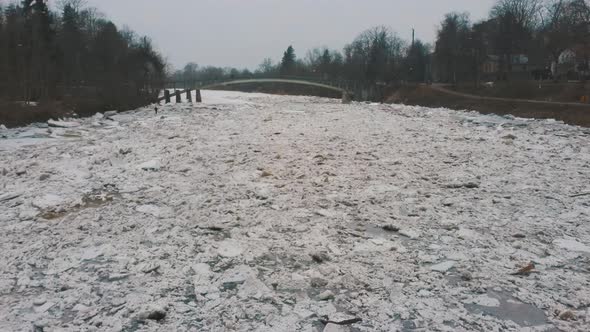 Aerial Dron Shot of the Huge Ice Loads Drift in the River Ogre, Latvia. 4K Video