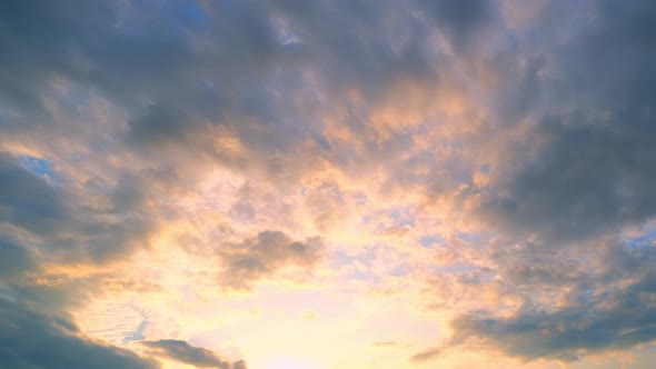 4K UHD : Time lapse of colorful sky during beautiful sunset. Romantic clouds