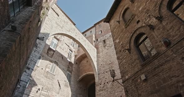 Old Medieval Perugia Town Stone and Brick Buildings establisher.Medium Shot. Friends Italian Trip in