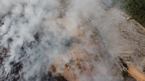 Aerial view burning at landfill site