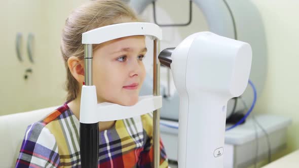 Ophthalmological Examination of the Girl on the Corneo Topographer