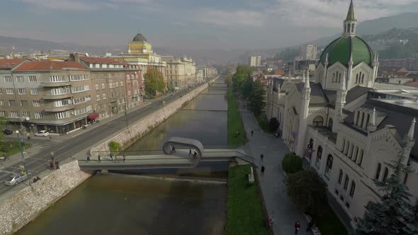 Aerial of the river with Festina Lente Looping Bridge