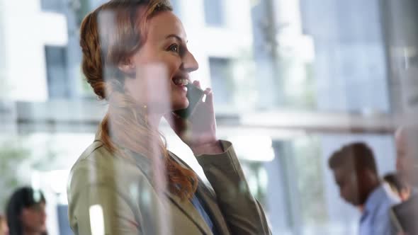 Businesswoman talking on mobile phone