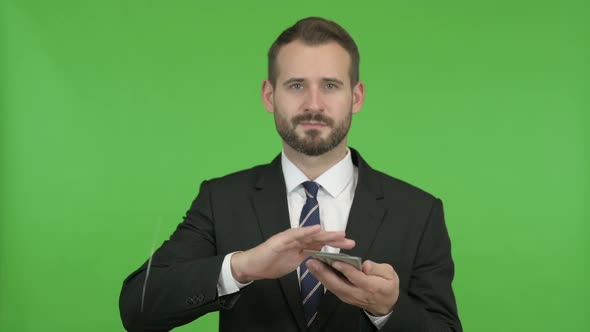 Happy Businessman Throwing Out Money Against Chroma Key