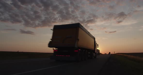 Traffic On The Highway At Sunset