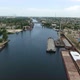 Aerial Shot of Dnipro Inflow Full of Barges and Ships on a Sunny Day in Summer - VideoHive Item for Sale