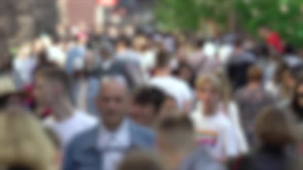 Silhouettes of People Walking in a Crowd Slow Motion