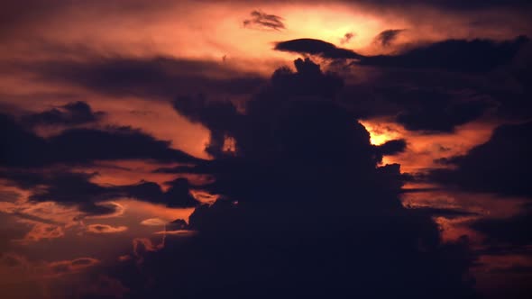 Dark Clouds With Golden Orange Sunset at Dusk