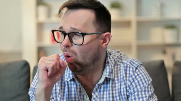 Portrait of Sick Young Man Coughing, Allergy