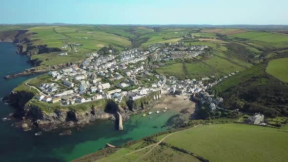 Picturesque Landscape Of Port Isaac And Lush Green Fields In Summer In Cornwall, England, United Kin