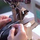 Manufacturing shoes in shoe factory. Sewing shoes from natural leather (close-up) - VideoHive Item for Sale