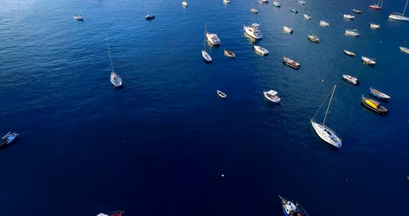 Boats floating on sea surface