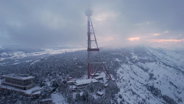 Snowy Sunset On The Foggy Hill