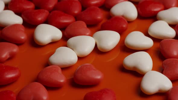 Rotating stock footage shot of Valentines decorations and candies - VALENTINES 0065