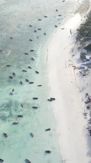 Boat Boats in the Ocean Near the Coast of Zanzibar Tanzania Slow Motion Vertical Video