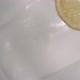 A sliced lemon falls onto yogurt and lemon rain follow - High-angle shot - VideoHive Item for Sale