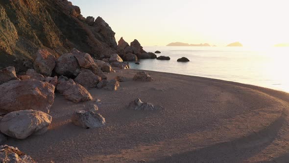 Sandy Beach and Rocky Coastline