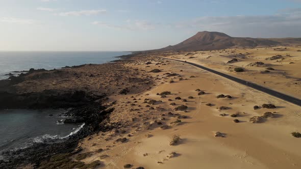 Aerial view of a road along the coast, Fuerteventura, Canary Islands, Spain.