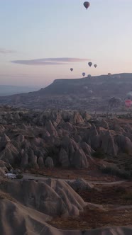 Vertical Video of Hot Air Balloons Flying in the Sky Over Cappadocia Turkey