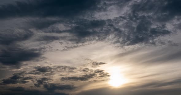 Silhouettes of Clouds Floating in Sky at Sunset Timelapse