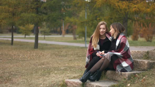 Two Girls in Autumn Park