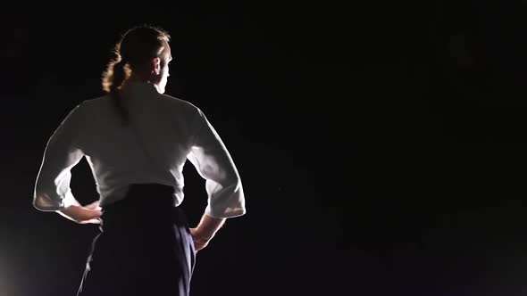 Master Martial Arts Aikido Training Isolated on Spotlights Background. Slow Motion. Close Up.