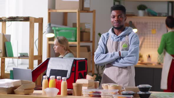 Portrait of Afro-American Male Worker in Food Delivery Kitchen