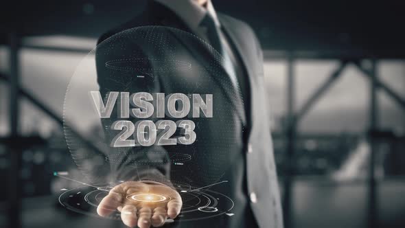 Businessman with Vision 2023 Hologram Concept