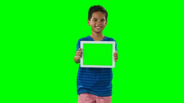 Smiling boy showing digital tablet 4k