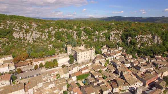 Aerial travel drone view of Balazuc, Southern France.
