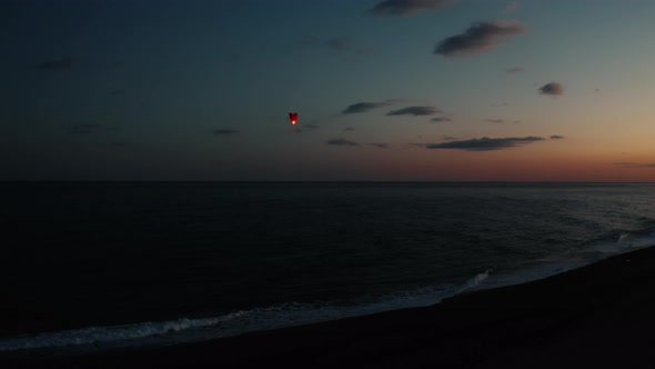 Chinese Lantern Flying In The Sky at Sunset Light