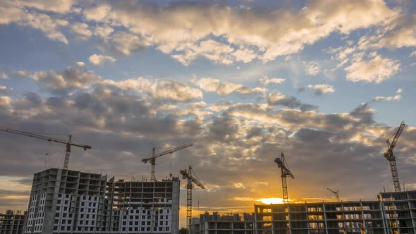 Construction Site Cranes and Dusk