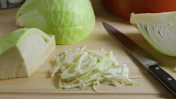  Fresh halved white cabbage and cuttings close up